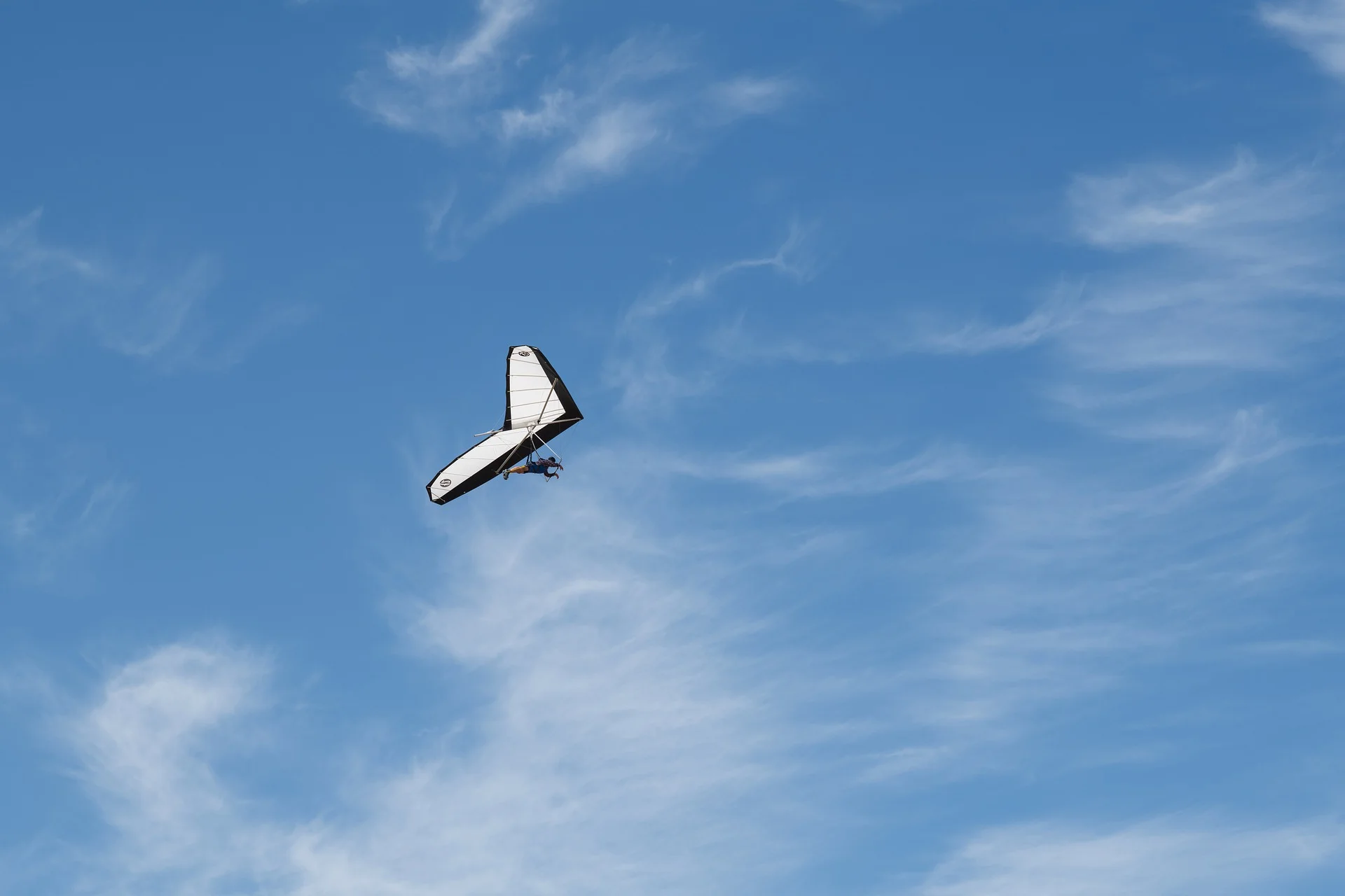 hang glider soaring through the air