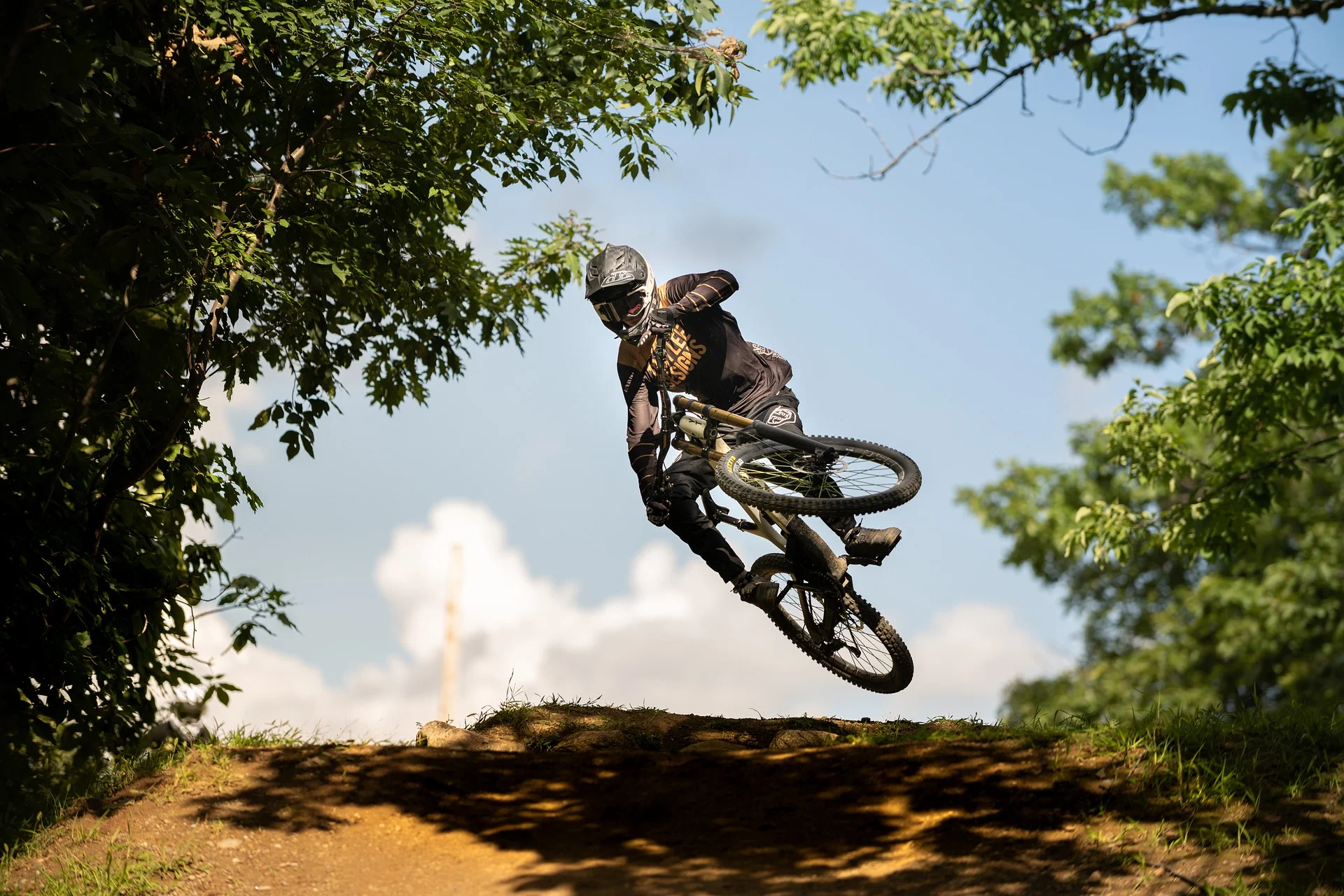 mountain biker mid-air during a jump